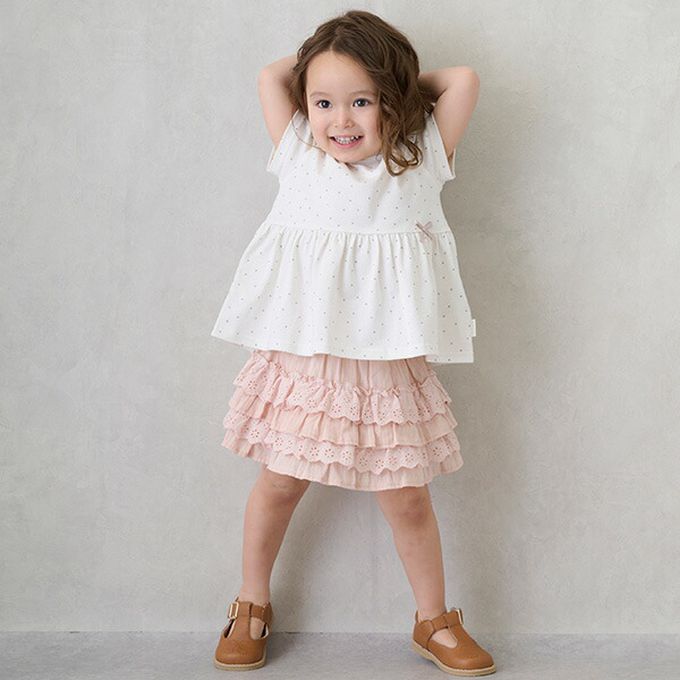 日本 petit main - 荷葉袖傘狀層次短袖上衣-滿版愛心-桃粉