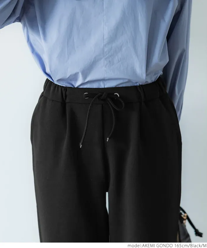 日本 COCA - 裏起毛率性休閒錐型褲-象牙白