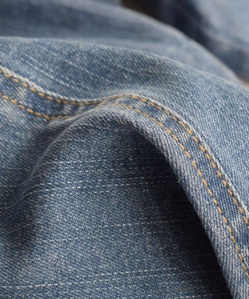 日本 zootie - 顯瘦美腿 個性彈性丹寧牛仔褲-水洗淺藍