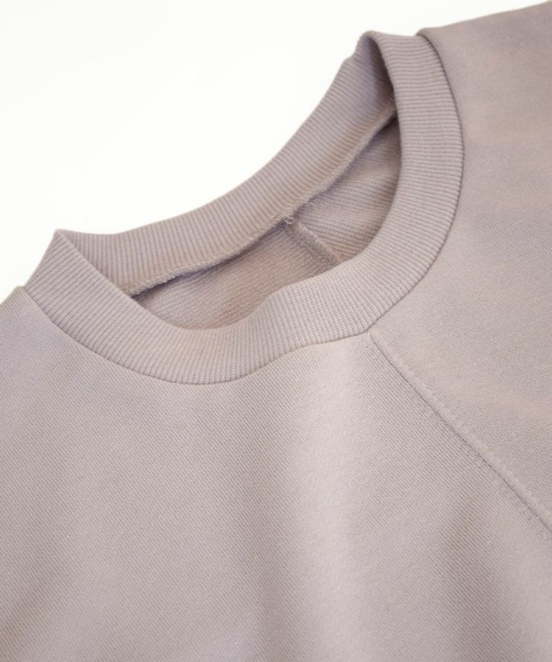 日本 zootie - 修身剪裁百搭前短後長長袖上衣-黑