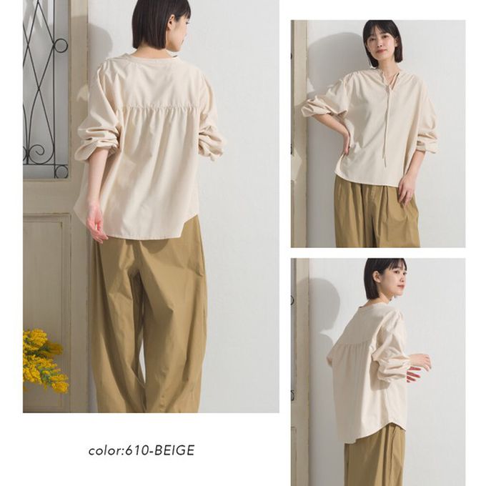 日本 OMNES - 柔滑科技棉 俐落感綁帶澎袖上衣-白