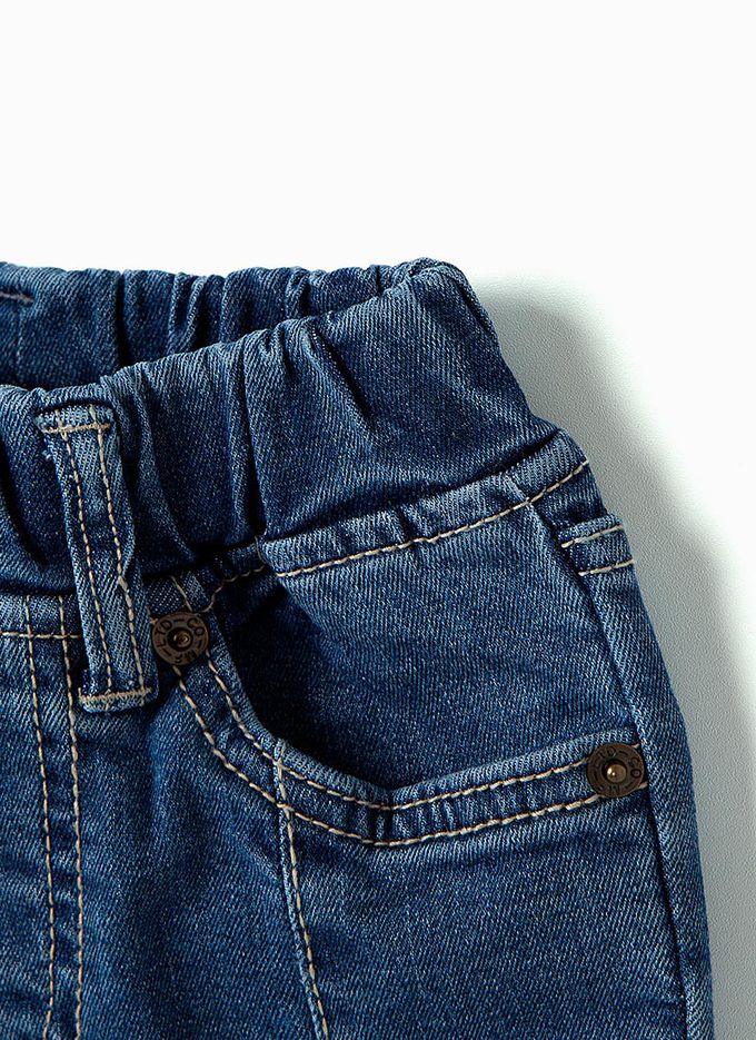 韓國 OZKIZ - 鬆緊腰修飾腿型喇叭長褲-深藍