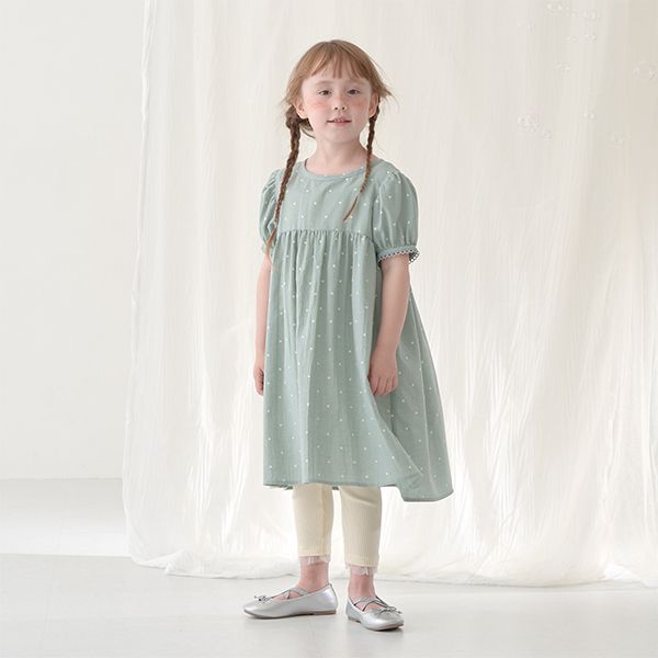 日本 Lycee mine - 下擺薄紗點綴羅紋9分內搭褲-卡其