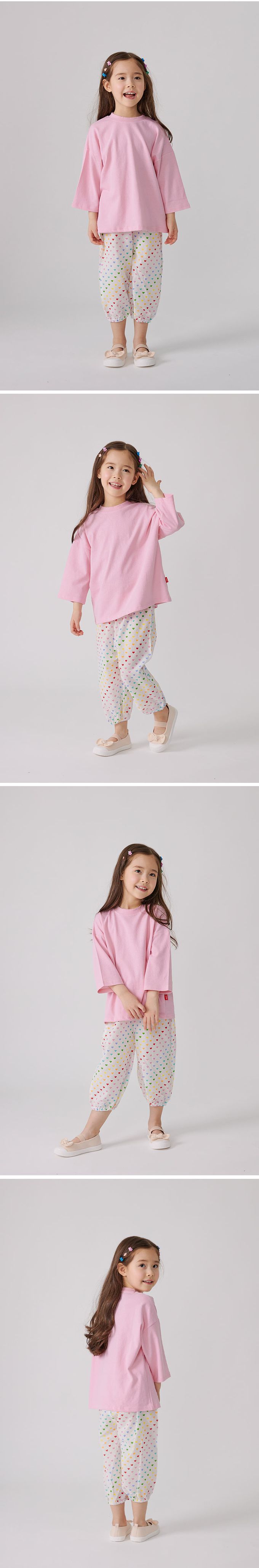 韓國 OZKIZ - 鬆緊腰滿版印花縮口防蚊褲-彩色愛心-白