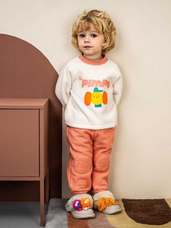 韓國Pimpollo - 圓臉插圖背釦保暖上衣-象牙色