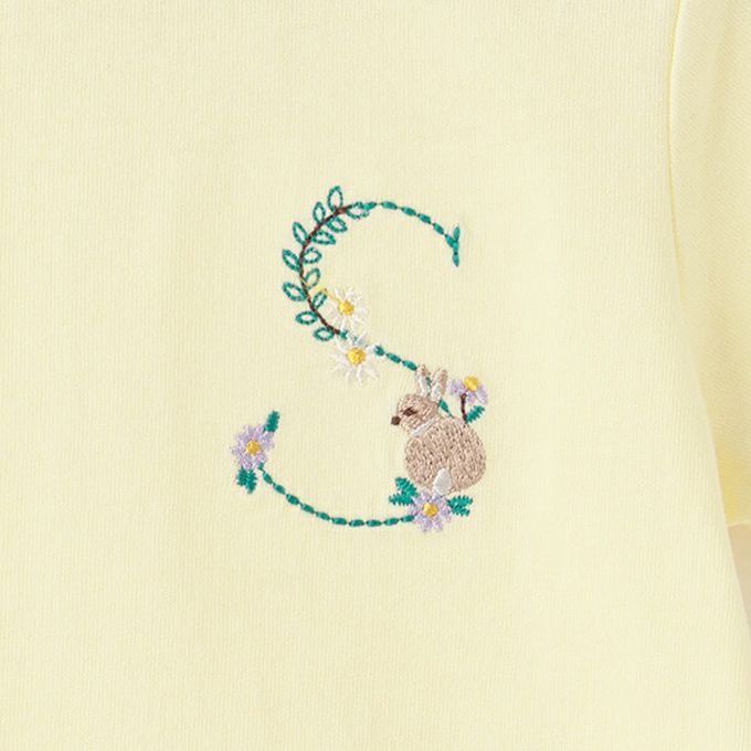 日本 petit main - 荷葉邊英文刺繡短袖上衣-R-白