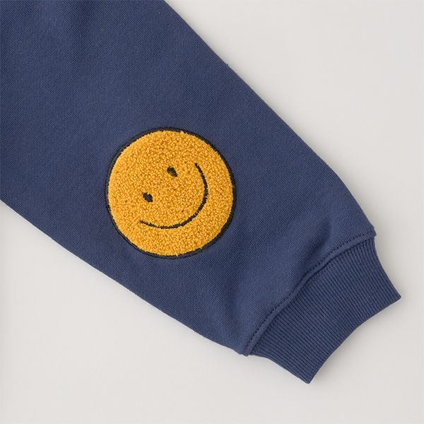 日本 b-ROOM - 療癒笑臉刺繡長袖上衣-深藍
