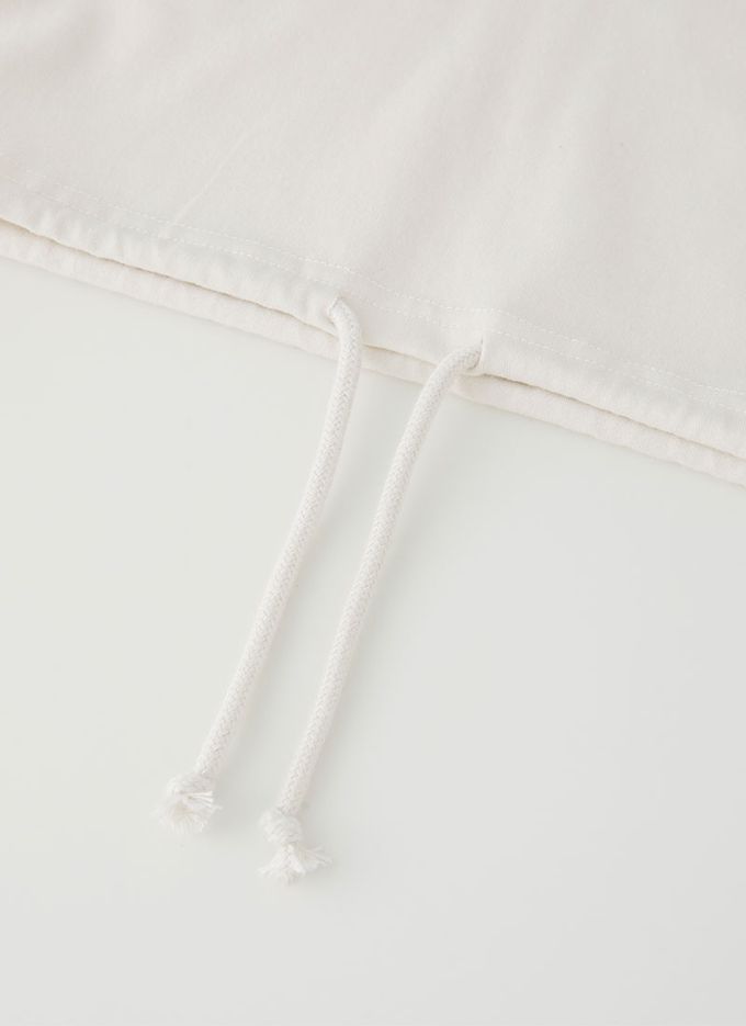 韓國 OZKIZ - 運動風字母印寬版長袖上衣-象牙白