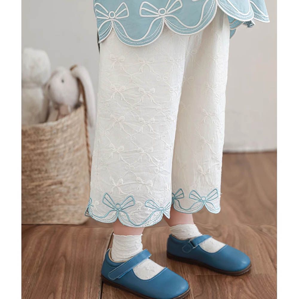 純棉花瓣褲腳八分褲-蝴蝶結刺繡-滿版繡花