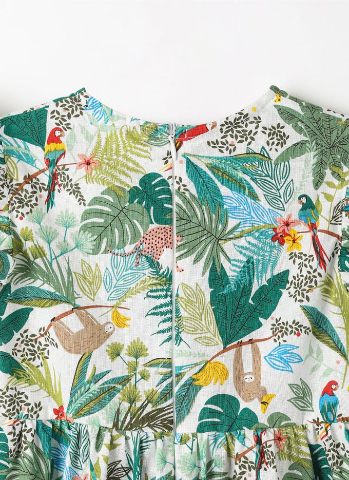 韓國 OZKIZ - (附包包帽子)熱帶棕櫚印飄逸荷葉袖洋裝-白X綠