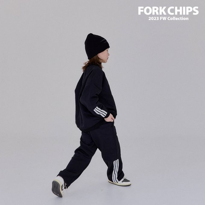 韓國 FORK CHIPS - 鬆緊腰穿越星星防風休閒長褲-黑