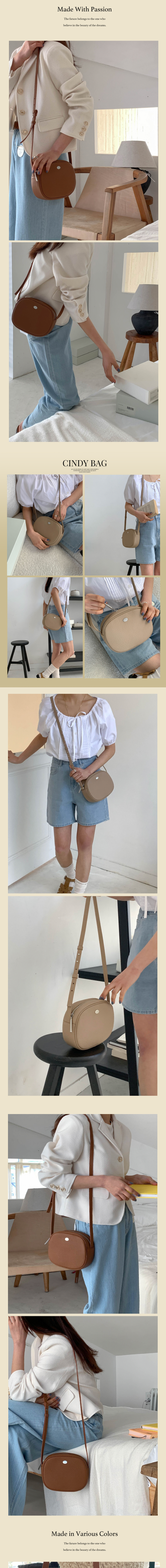 韓國 THEALLY - 簡約橢圓牛皮斜背包-焦糖咖