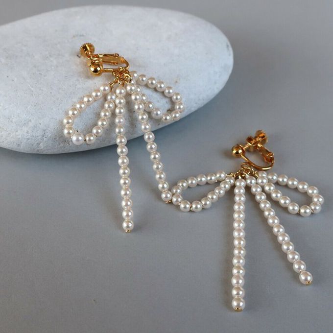 日本 Melody Accessory - 可愛感珍珠蝴蝶結耳環-金