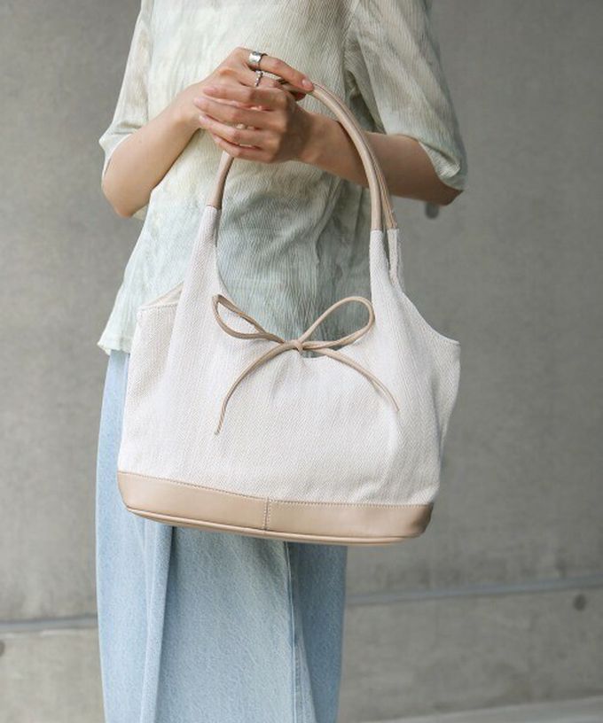 日本 Bab - 異素材成熟感蝴蝶結氣質手提包-藍x黑