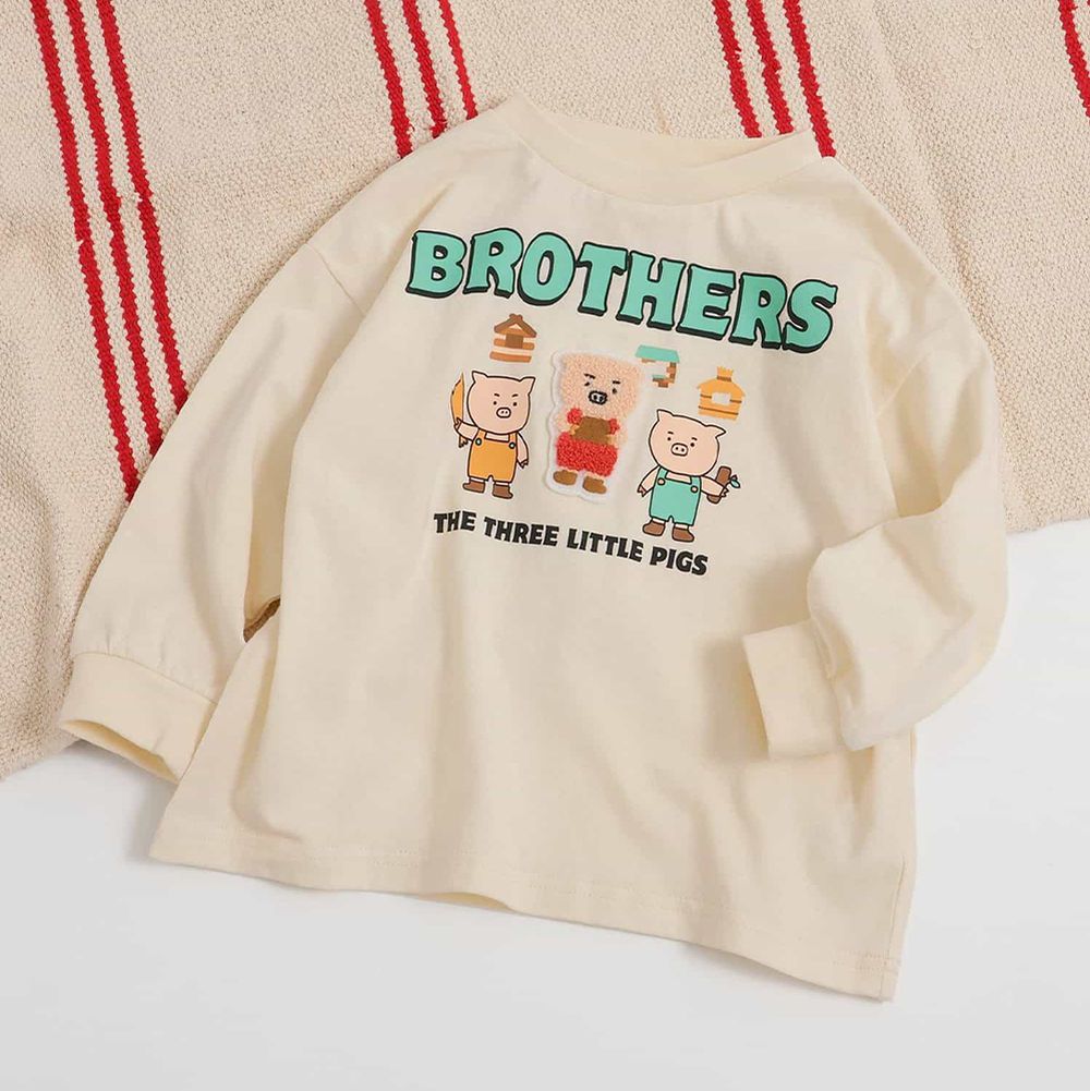 俏皮童話故事刺繡長袖上衣-三隻小豬-象牙白
