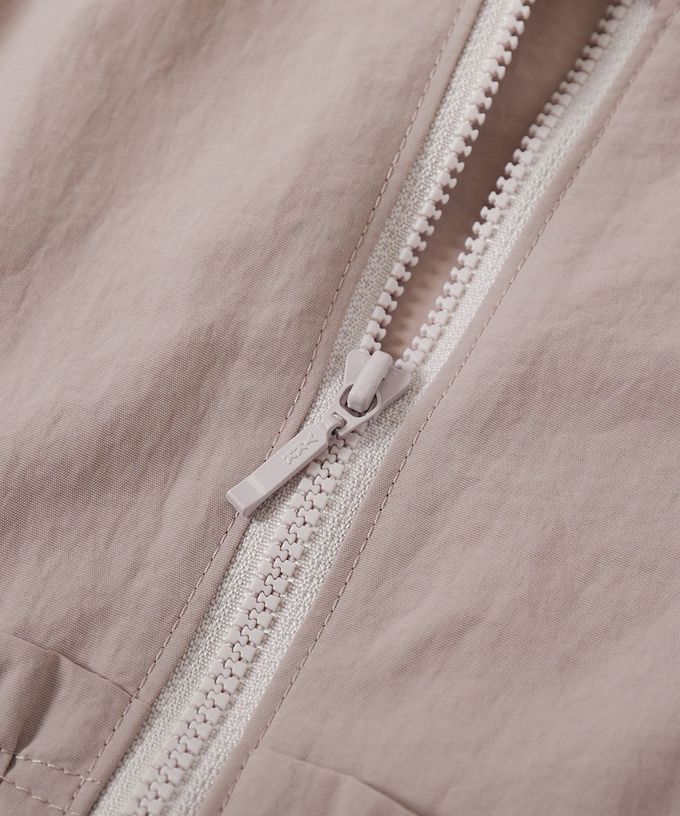 日本 devirock - 防潑水 層次荷葉輕量連帽風衣外套(帽可拆)-粉杏