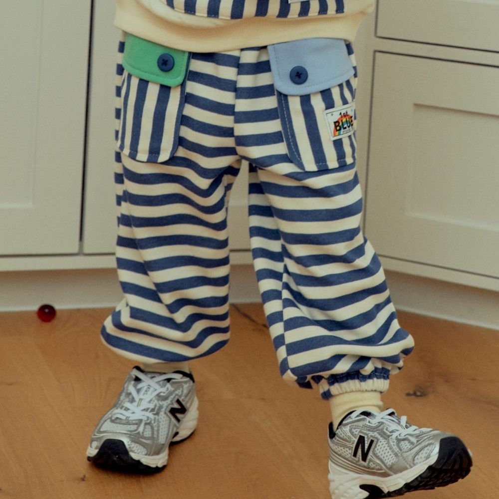 First Blue 鬆緊腰拼色口袋條紋縮口長褲-藍