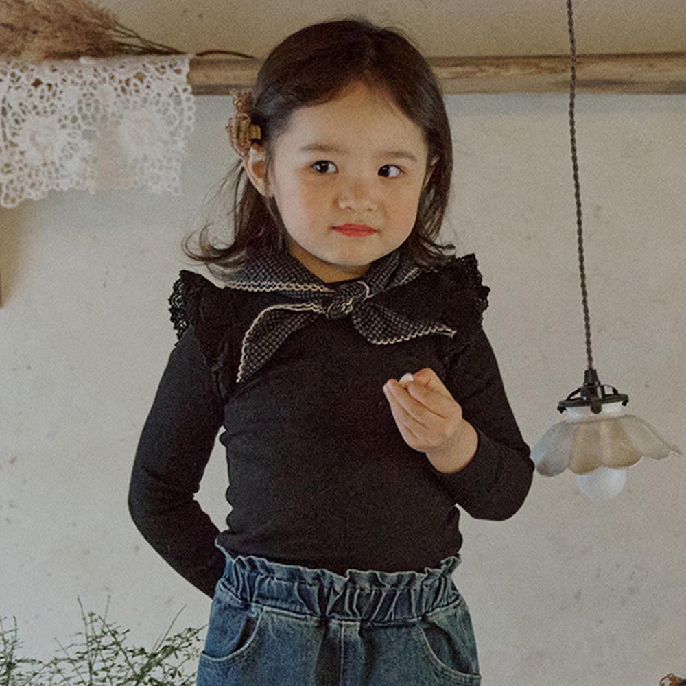韓國 Puellaflo - 肩膀小荷葉裝飾彈性長袖上衣-黑