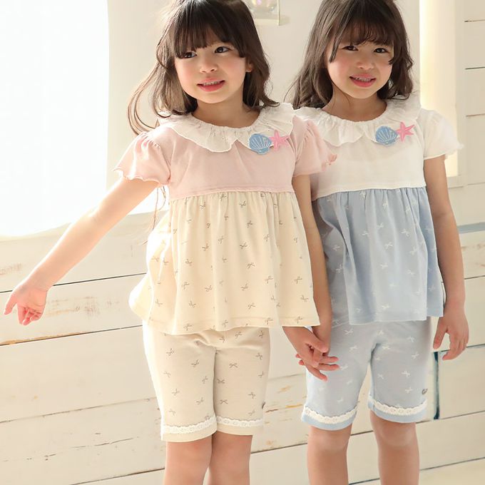 日本 ZOOLAND - 滿版蝴蝶結蕾絲滾邊短褲-貝殼口袋-淺藍