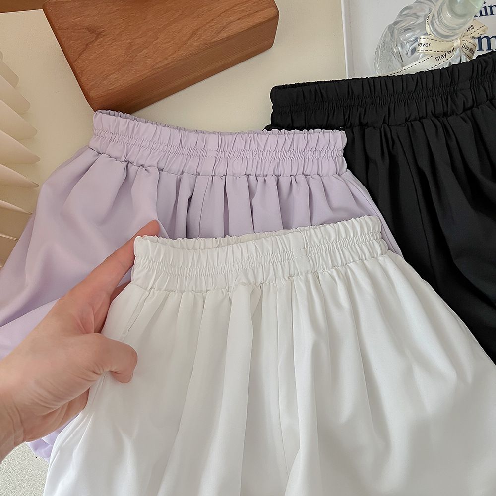 腰鬆緊顯瘦休閒花苞短褲-黑色