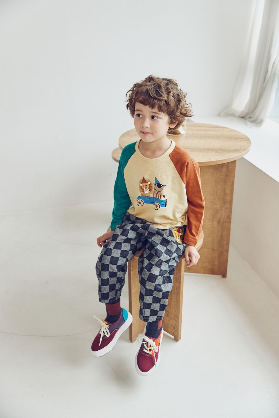 韓國 Mimico - 方塊格紋鬆緊腰休閒長褲-獅子與浣熊-黑