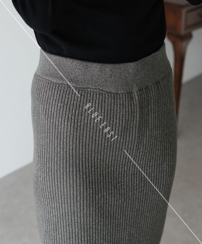 日本 BLUE EAST - 微閃亮羅紋針織流蘇開叉鉛筆裙-黑