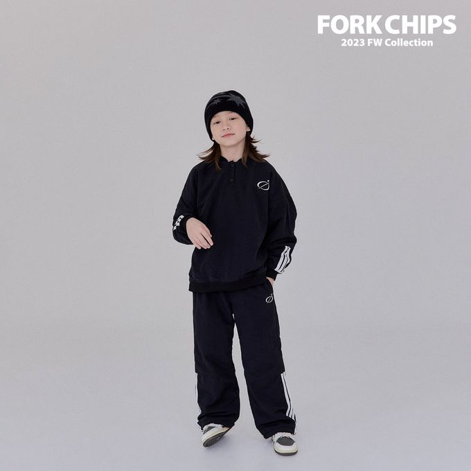 韓國 FORK CHIPS - 鬆緊腰穿越星星防風休閒長褲-黑