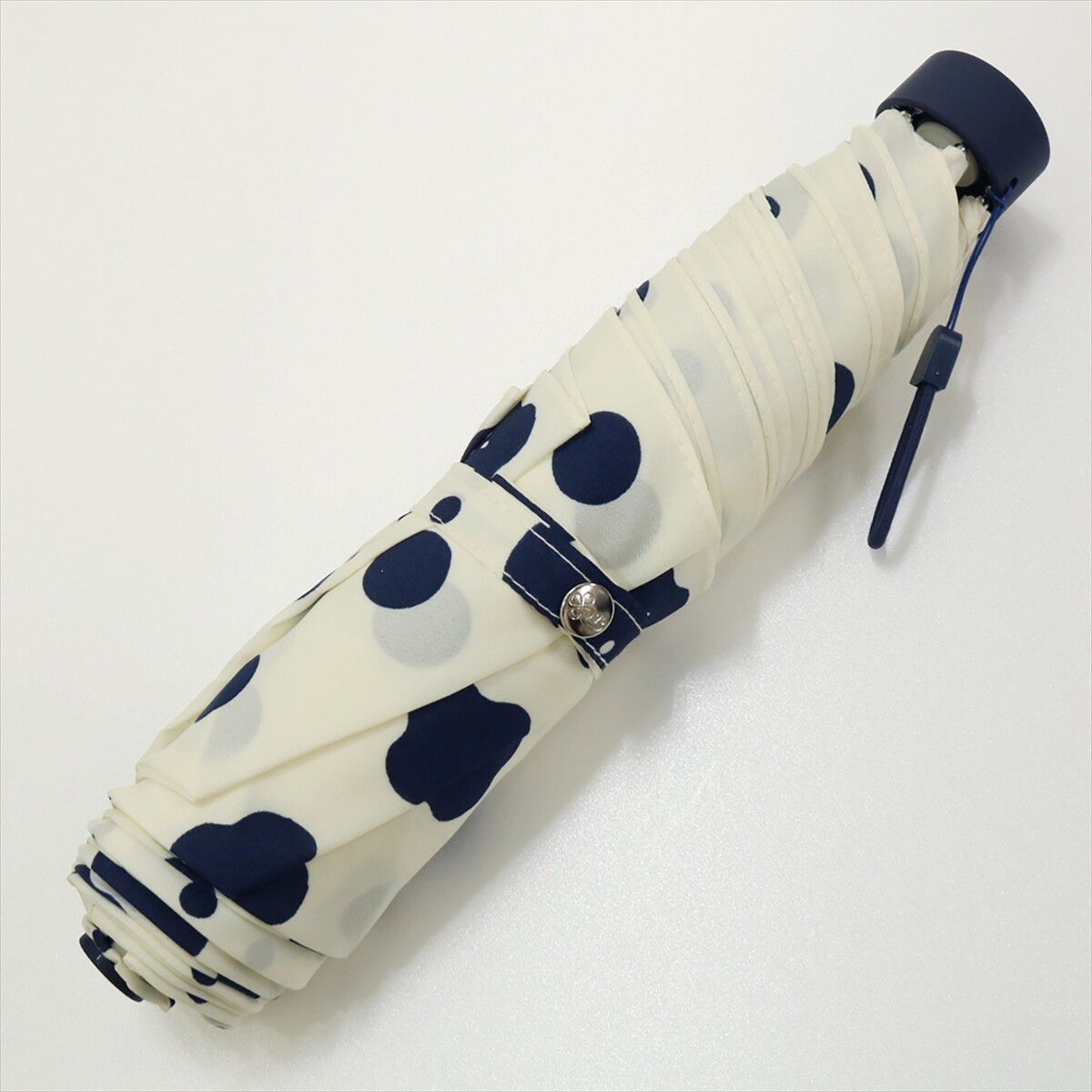 日本 nifty colors - 抗UV輕量 晴雨兩用折疊傘-點點花朵-深藍 (直徑98cm/201g)-90.0%