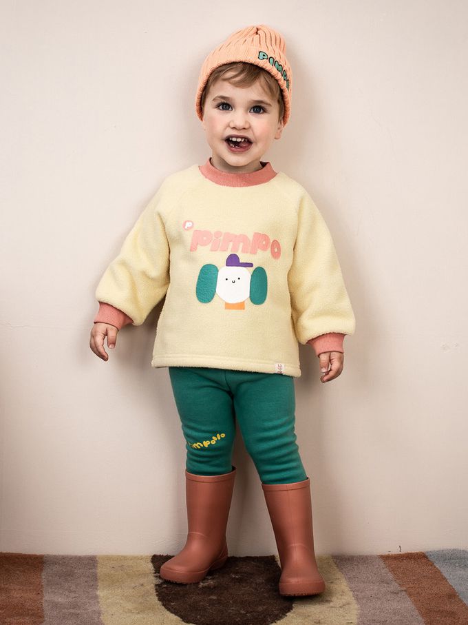 韓國Pimpollo - 圓臉插圖背釦保暖上衣-象牙色