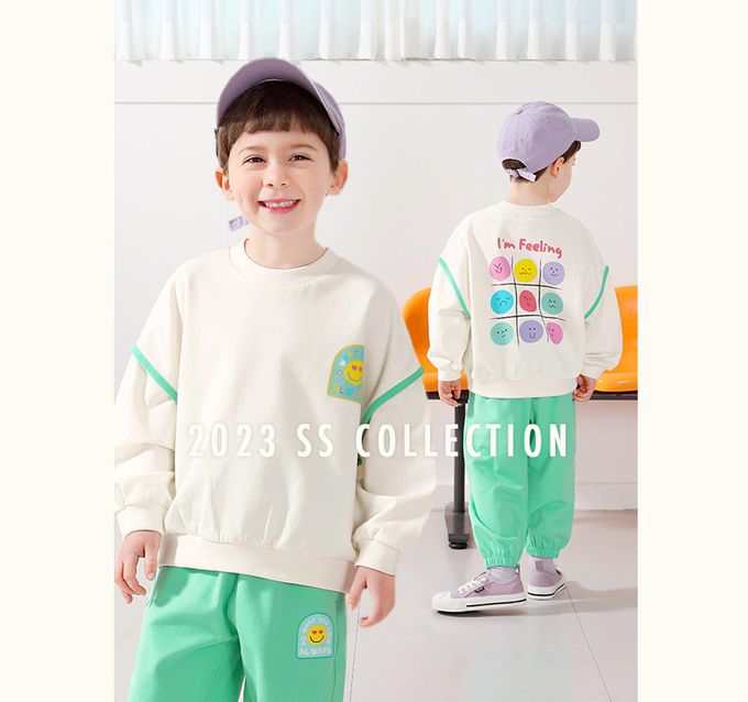 韓國 WALTON kids - 臉孔九宮格印長袖上衣-米白