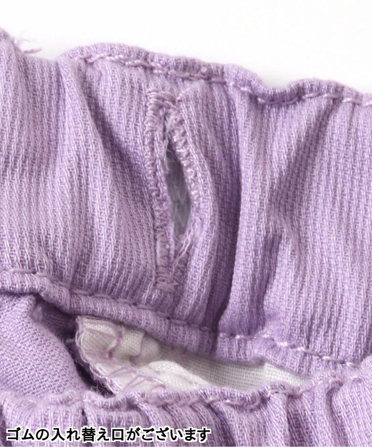 日本 apres les cours - 雛菊刺繡口袋下擺荷葉休閒九分褲-丹寧藍