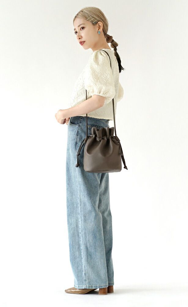 日本 zootie - 優雅歐風壓紋泡泡短袖上衣-象牙杏