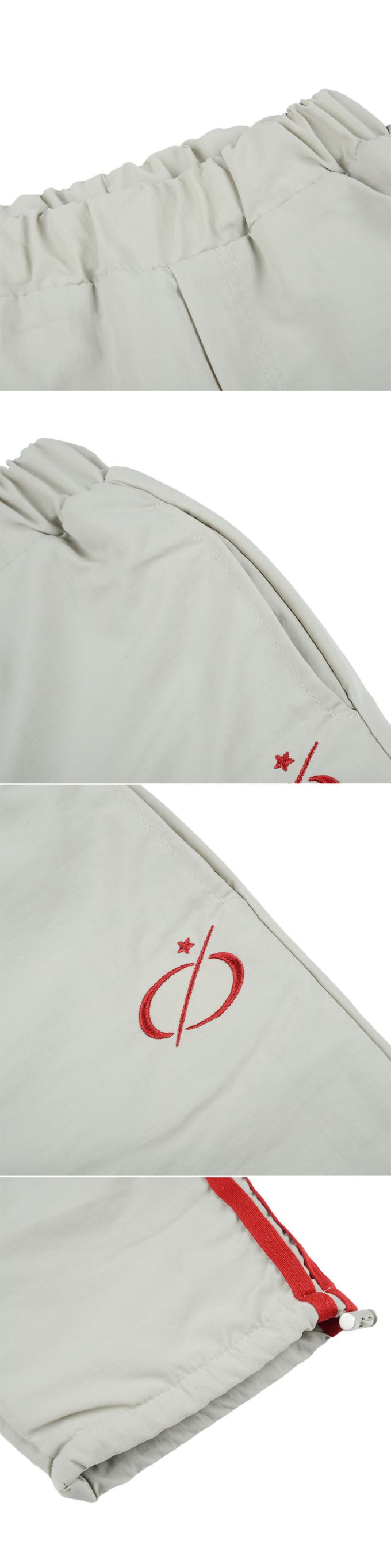 韓國 FORK CHIPS - 鬆緊腰穿越星星防風休閒長褲-黑