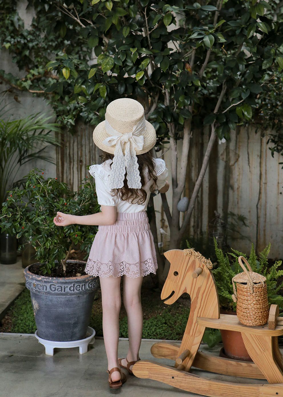 韓國 PuellaFLO - 蕾絲鏤空花瓣下襬褲裙-粉紅