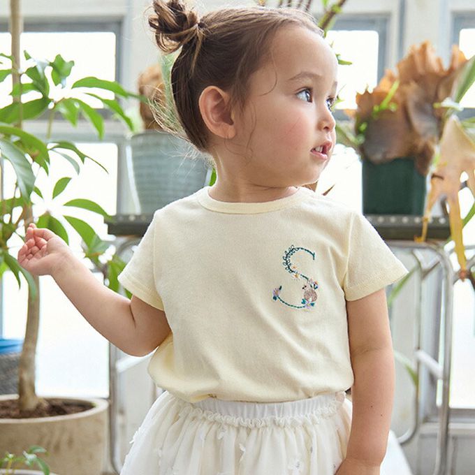 日本 petit main - 荷葉邊英文刺繡短袖上衣-M-桃粉