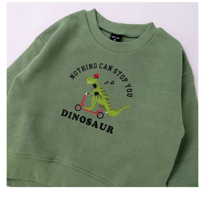 日本 ZOOLAND - 印花圓領保暖長袖上衣-恐龍騎車爆米花-開心果綠