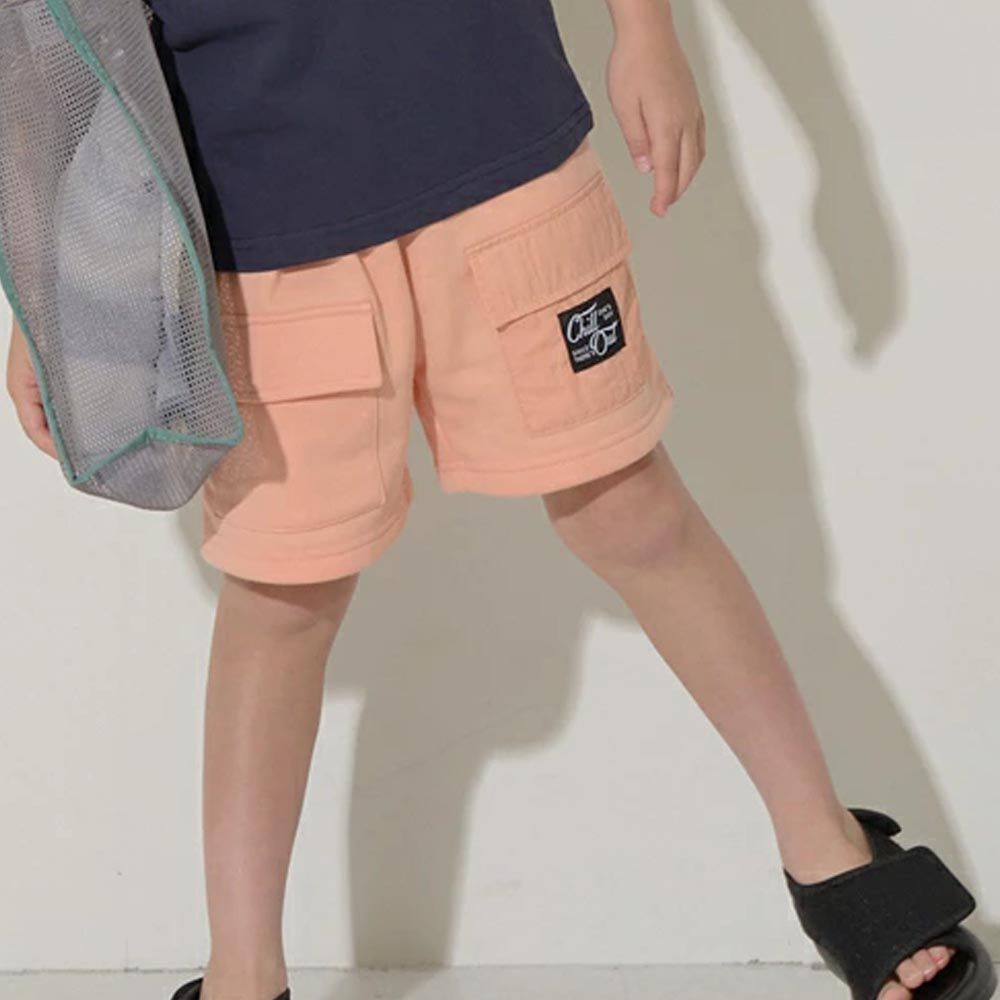 日本 b-ROOM - 大口袋素色休閒五分褲-粉橘