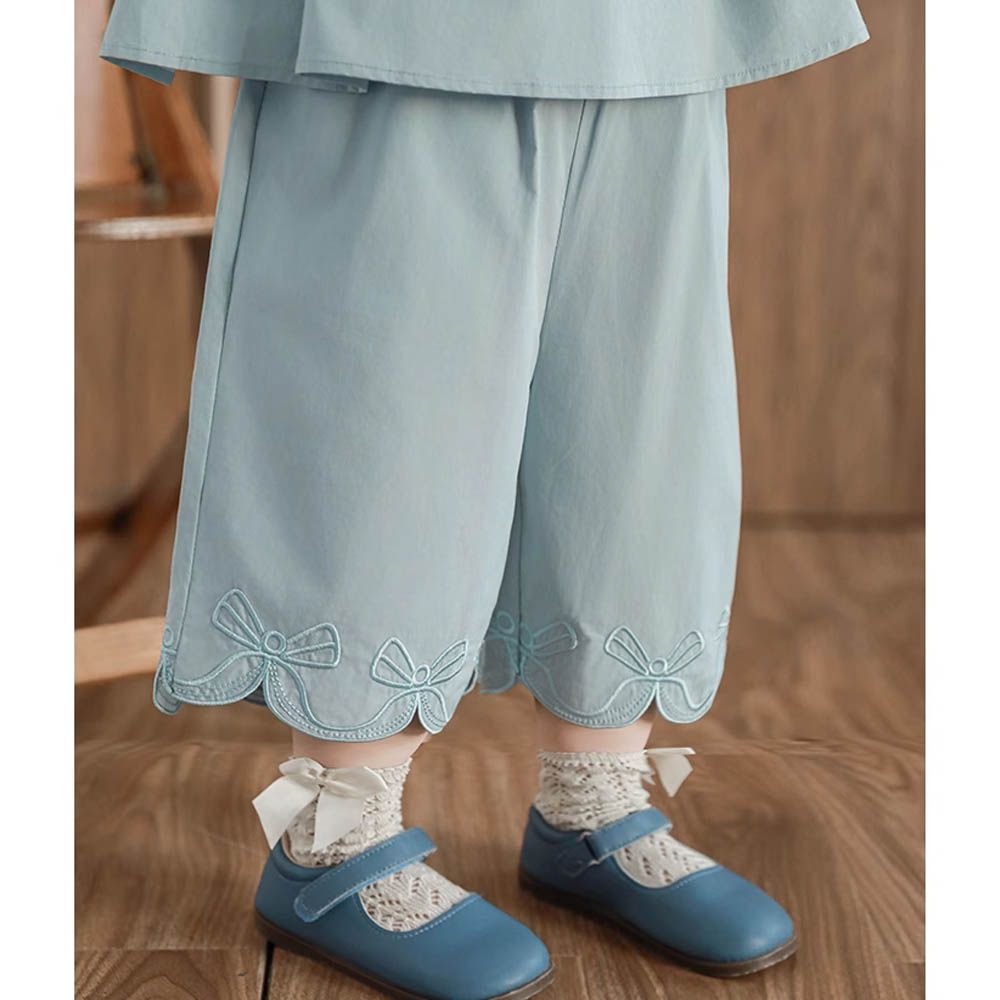 純棉花瓣褲腳八分褲-蝴蝶結刺繡-藍色