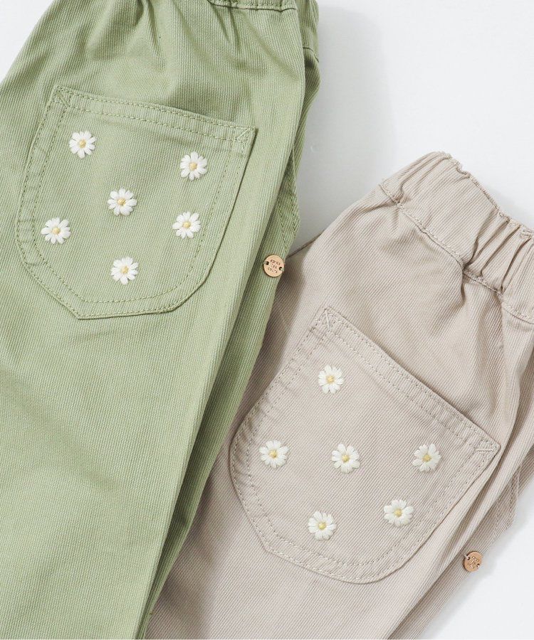 日本 apres les cours - 雛菊刺繡口袋下擺荷葉休閒九分褲-丹寧藍