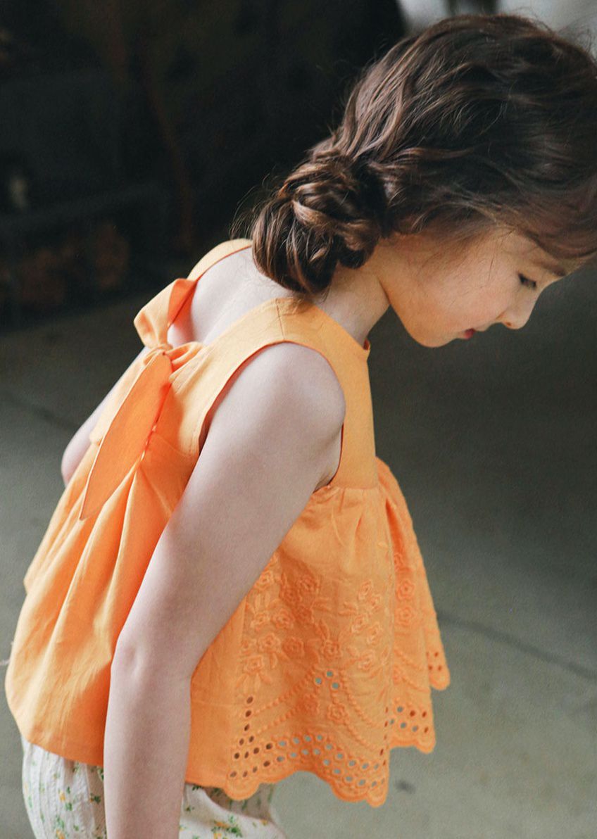 韓國 PuellaFLO - 後背蝴蝶結鏤空雕花上衣-橘