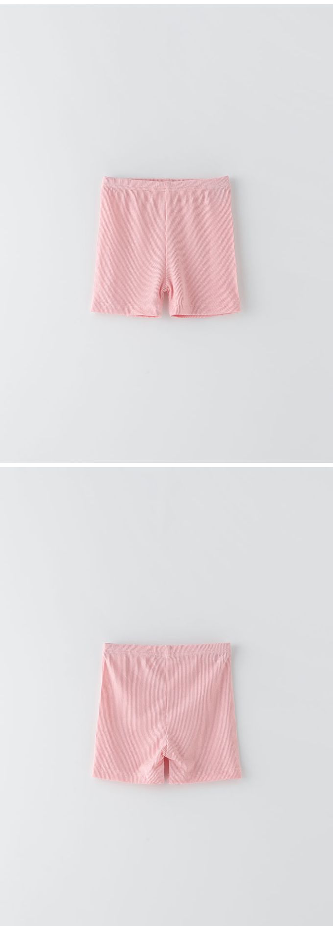 韓國 OZKIZ - 簡約純色彈性內搭短褲-鵝黃